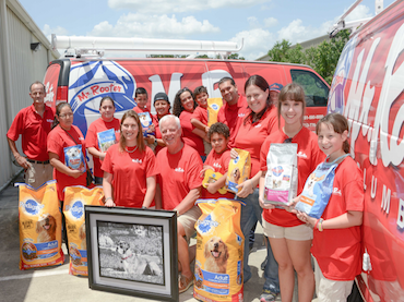 Local plumbing company collects over 1.5 tons of food to benefit four-legged friends