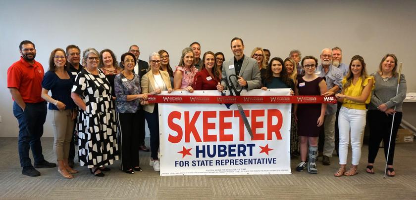 Candidate Skeeter Hubert cuts the ribbon on his campaign