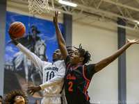 HS Boys Basketball: Fast-Paced Cavaliers Blaze Past Grizzlies in District Opener
