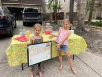 Local youngsters set up lemonade stand to do what they can to help cure cancer