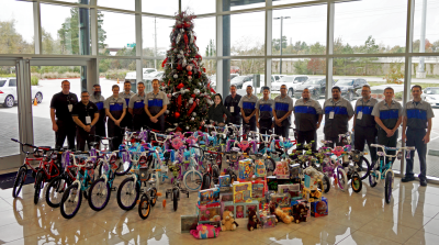 Mercedes-Benz of the Woodlands donates bicycles, toys to Interfaith