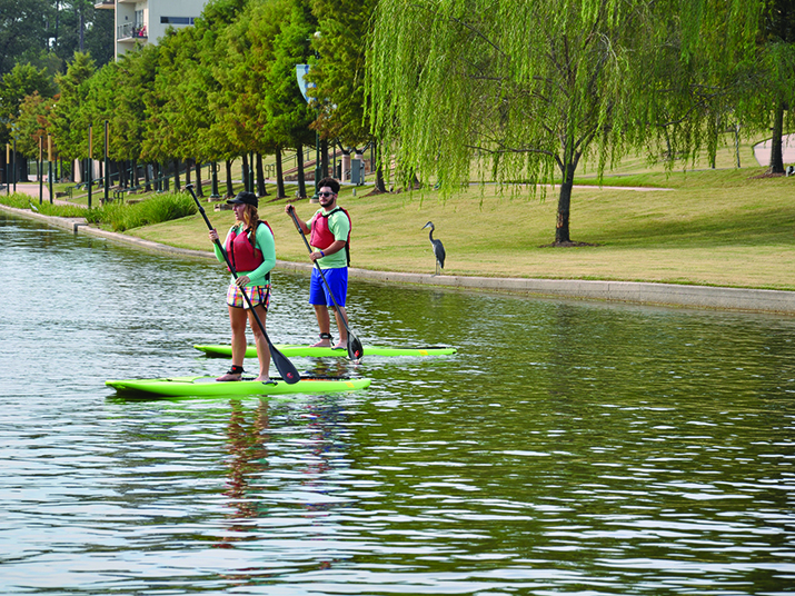 Practice yoga on the water of Lake Woodlands