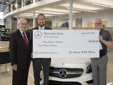Mercedes-Benz of The Woodlands gives donations to two local non-profits