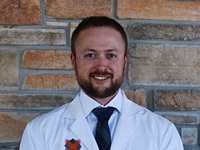 Chris Midtling, DDS, MD, Achieves Diplomate Status