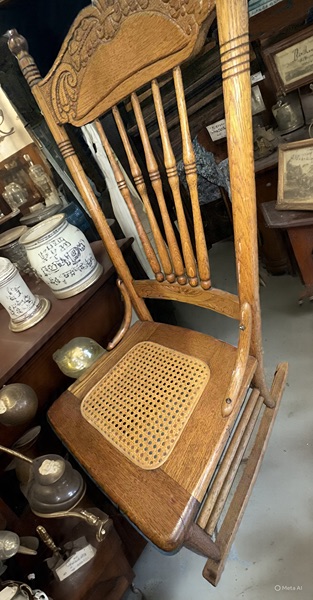 Antique oak cane rocking chair