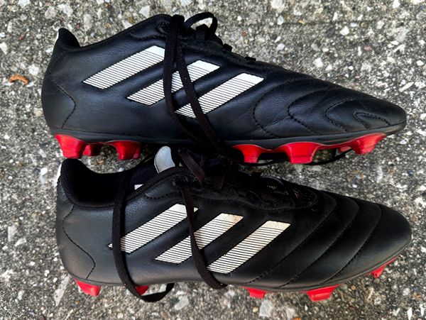black and red soccer cleats