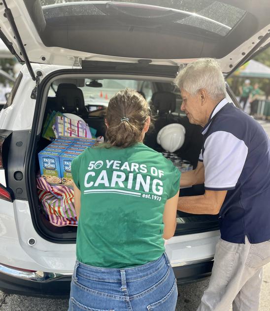 Community Partner donates food to Day of Caring Food Drive