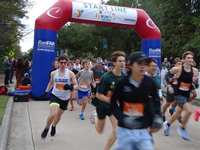 Nearly 5,000 runners and walkers kick off Thanksgiving at the 34th YMCA Run Through the Woods