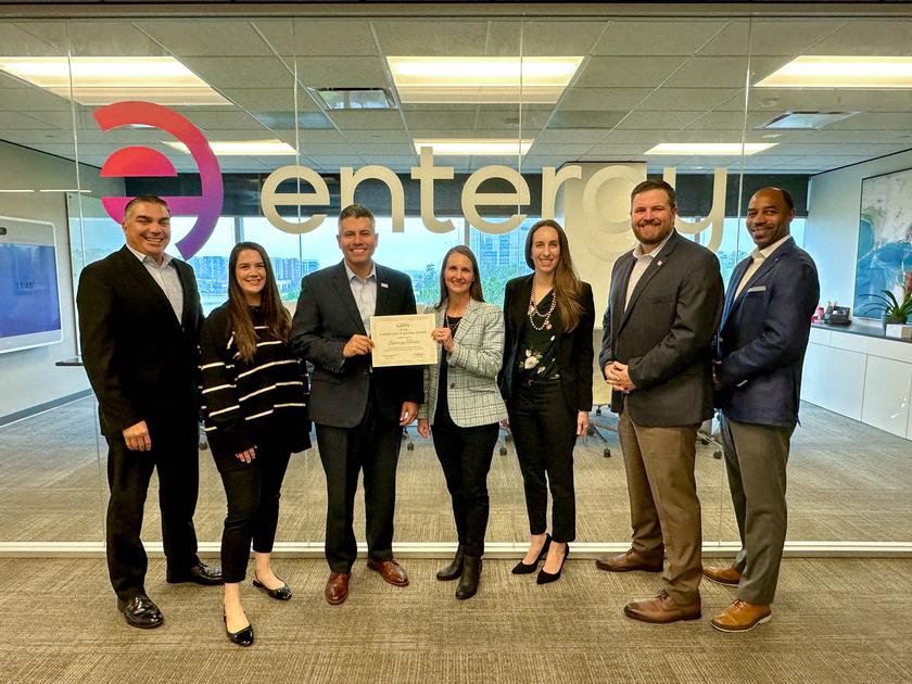 Pictured left to right: Stuart Barrett – Vice President of Customer Service for Entergy Texas, Corrin Barrow – Public  Affairs Representative II for Entergy Texas, Eliecer 