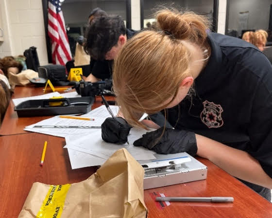 Future detectives in training: High school students log evidence sharpening their forensic skills during the Crime Scene Investigation challenge at a regional TXPSTA High School First Responders Competition in December. The statewide competition is set for Feb. 24, 2024, at Lone Star College-University Park.   