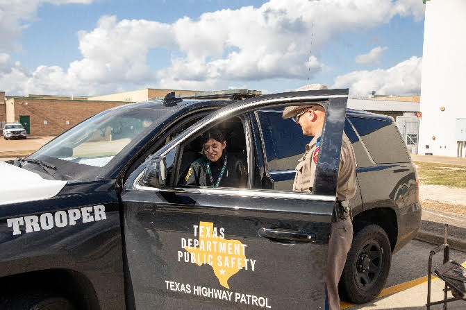 During the December regional TXPSTA High School First Responders Competition, a student performs a misdemeanor traffic stop simulation skills test under the guidance of a Texas Highway Patrol Trooper. The statewide competition will take place Feb. 24, 2024, at Lone Star College-University Park.