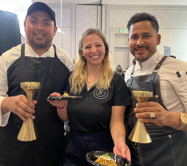 Chef of Chefs winner Edgar Morales, left, from Del Frisco, before winning the $5,000 Grand Prize 