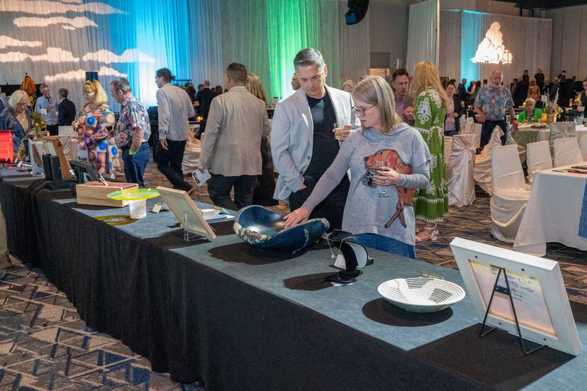 Photo Credit: Kathleen O. Ryan - The Compounding Pharmacy with Artist Taman VanScoy at the 2026 Art Dash Party