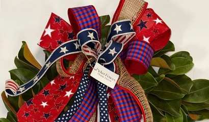 /images/ps/21709/410x240/magnolia-wreath-w-patriotic-bow1.jpg