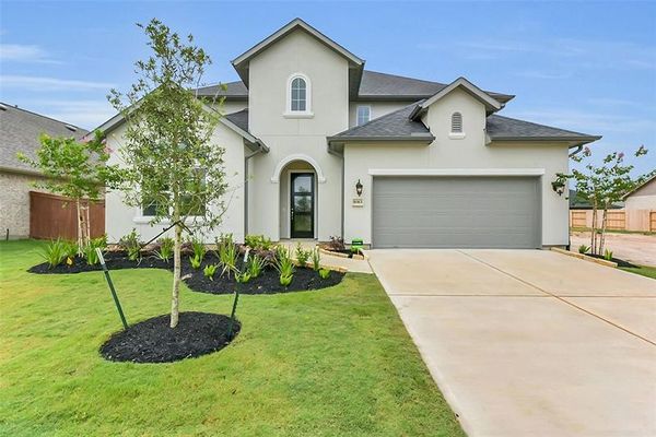 Front yard and exterior of 16163 Sheridan River