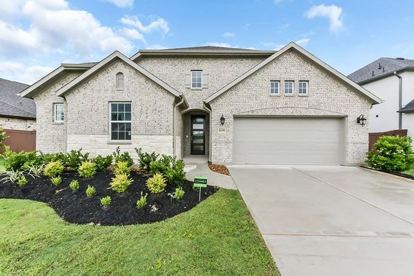 Front yard and exterior of 16159 Sheridan River