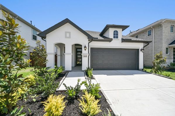Front yard and exterior of 16315 Placid Stream