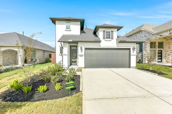 Front yard and exterior of 13119 Hidden Village