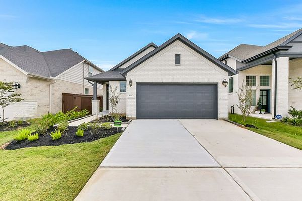 Front yard and exterior of 16323 Placid Stream